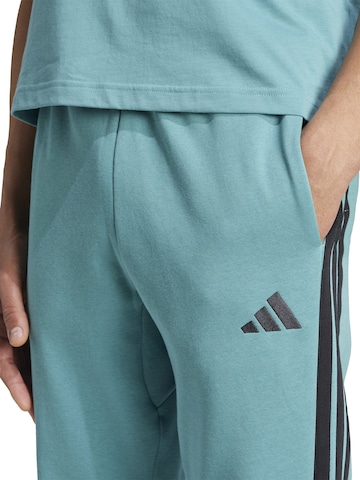 ADIDAS SPORTSWEAR Tapered Sports trousers in Blue