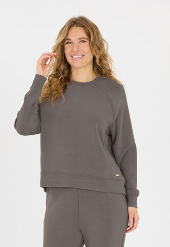 Athlecia Sportief sweatshirt 'Jacey' in Bruin: voorkant