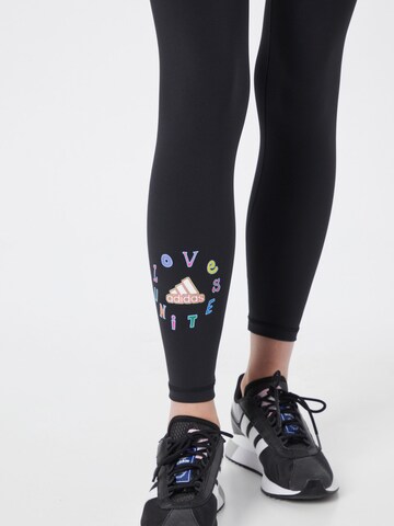 Skinny Pantaloni sportivi 'Love Unites Believe' di ADIDAS SPORTSWEAR in nero