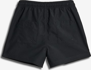 SOMETIME SOON Board Shorts in Black