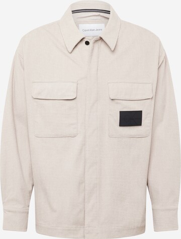 Calvin Klein JeansComfort Fit Košulja - bež boja: prednji dio