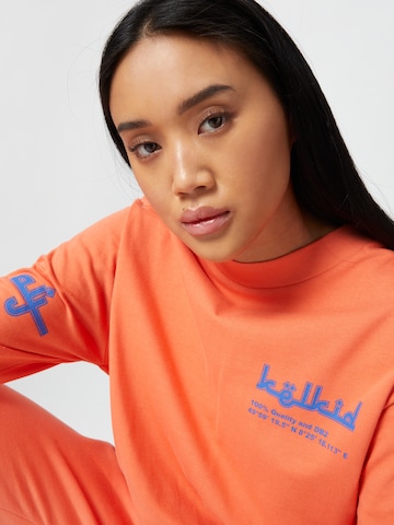 ABOUT YOU x Mero - Camiseta 'Kelkid' en naranja