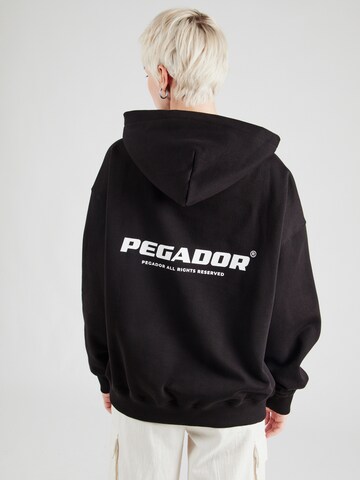 Sweat-shirt 'ATNA' Pegador en noir : devant