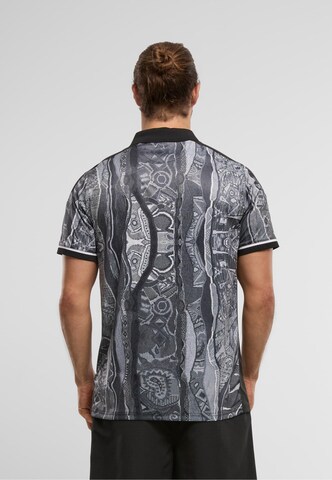 Maglietta 'Soccer Team' di Carlo Colucci in nero