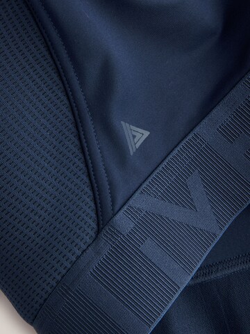 Next - Soutien Bustier Soutien de desporto 'Ultimate' em azul