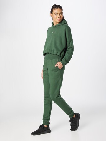 NEBBIA Tapered Sportbroek in Groen