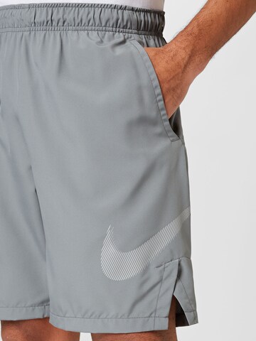 NIKE Ohlapna forma Športne hlače | siva barva
