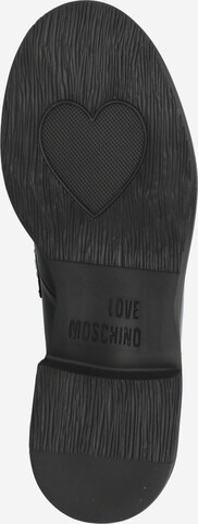 Slipper 'CITY LOVE' di Love Moschino in nero