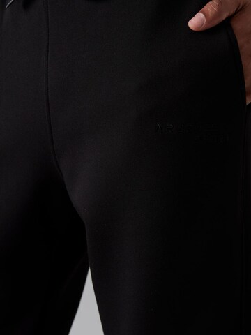 Tommy Life Trainingspak 'Aktive Sets' in Zwart