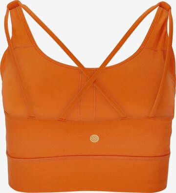 Athlecia Medium Support Sports Bra 'Gaby' in Orange