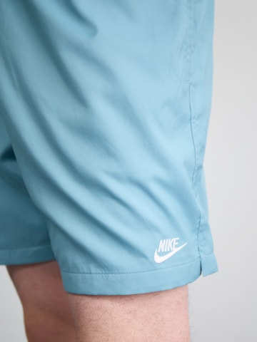 Nike SportswearLoosefit Hlače 'Club' - plava boja