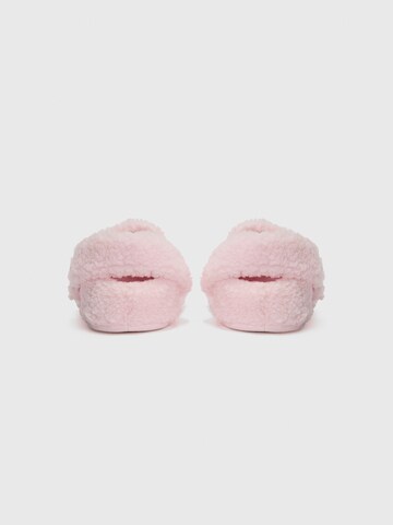 Pantoufle 'Classic Cozzzy' Crocs en rose