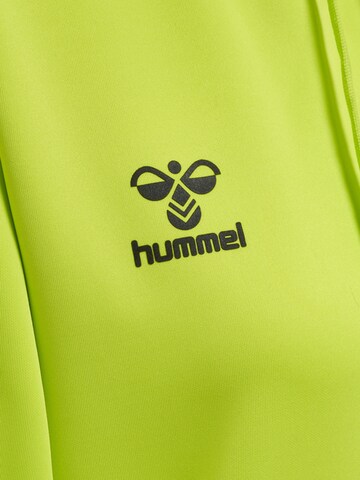 Hummel Urheilullinen collegepaita värissä vihreä