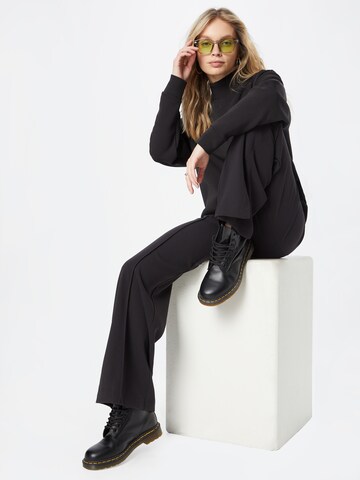 Calvin Klein Voľný strih Nohavice s pukmi - Čierna