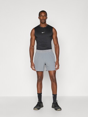 regular Pantaloni sportivi di NIKE in grigio