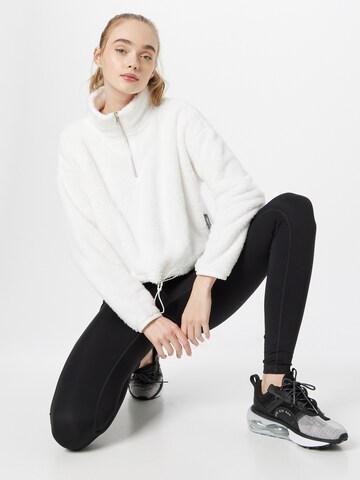 Onzie Sports sweater in Beige