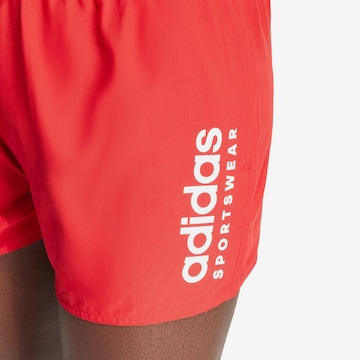 ADIDAS PERFORMANCE Athletic Swim Trunks 'Essential' in Red