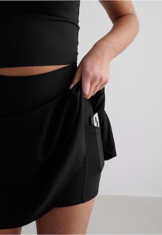 Jupe de sport 'Sense' Aim'n en noir