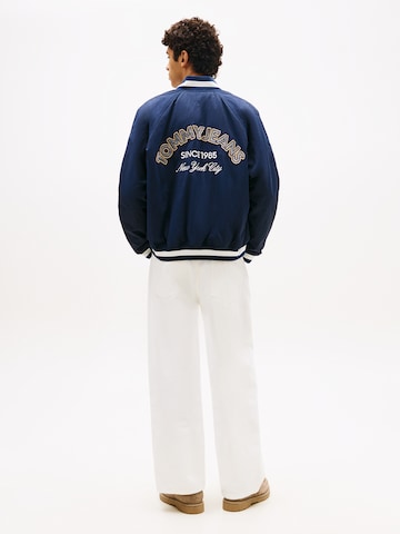Tommy Jeans Átmeneti dzseki 'VARSITY' - kék