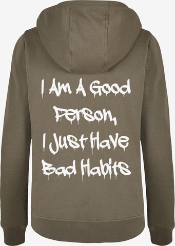 Merchcode Sweatshirt 'Bad Habits' in Grün