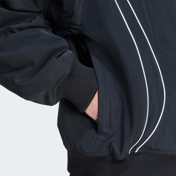 ADIDAS ORIGINALS Sportjacke 'Teamgeist' in Schwarz