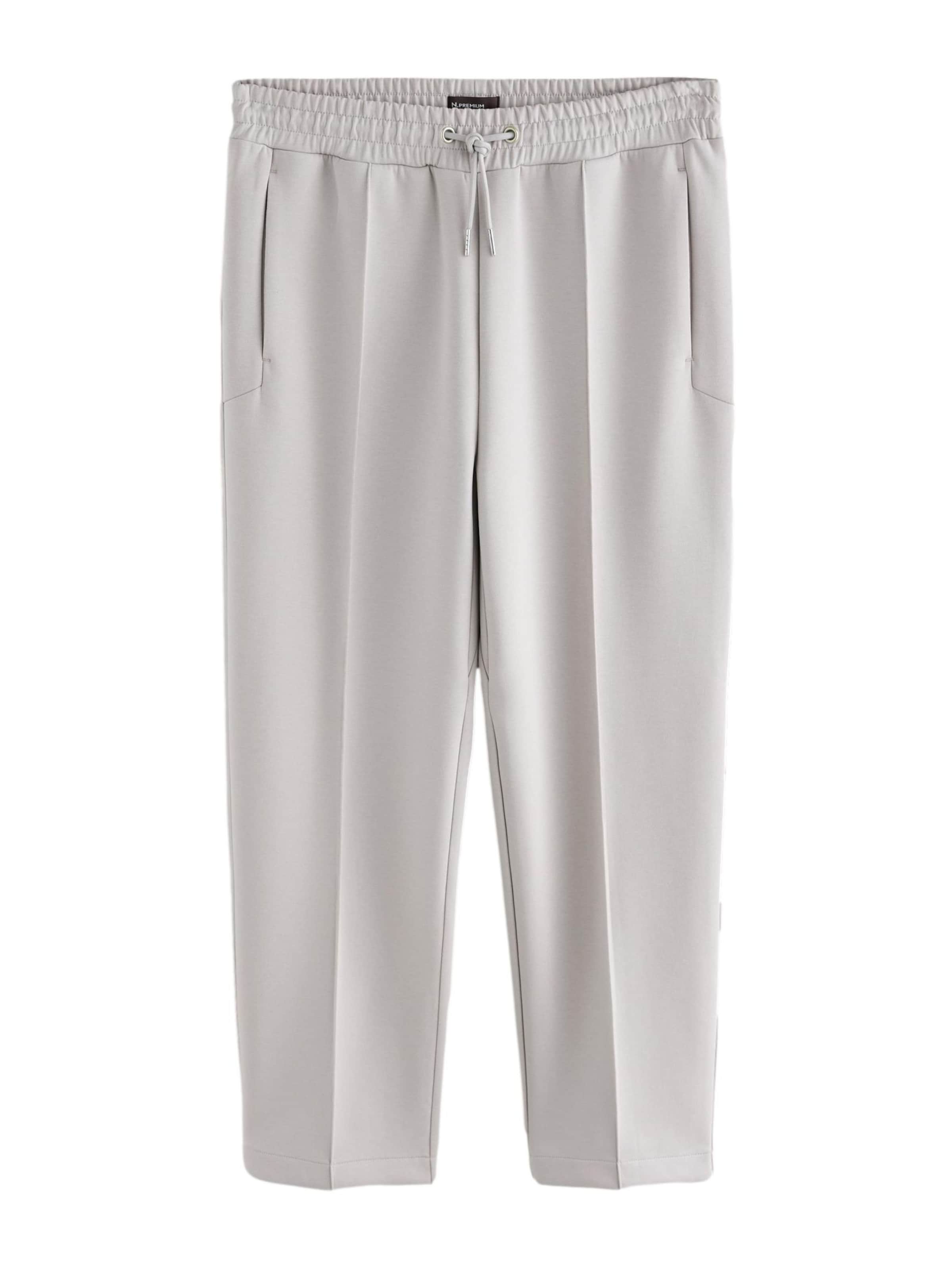 Next Slimfit Pressveckad byxa i grå: framsida