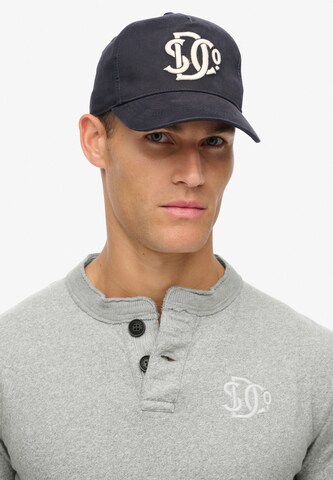 Superdry Pet 'The Merchant Store'' in Blauw: voorkant