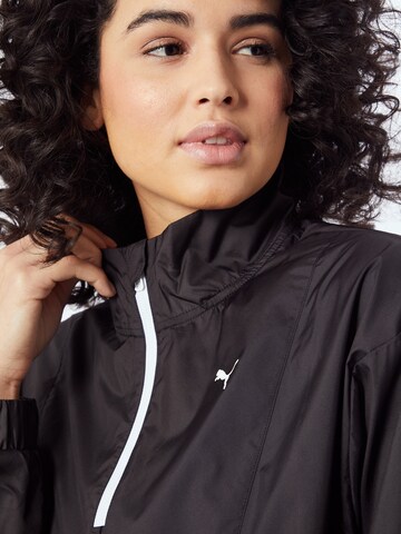 PUMA Sportjacke in Schwarz