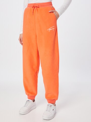 Tommy Jeans Tapered Pants in Orange: front