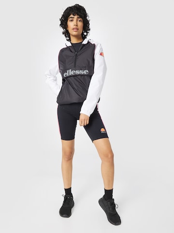 Skinny Pantaloni sport 'Rene' de la ELLESSE pe negru