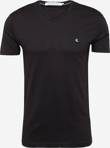 T-Shirt Calvin Klein Jeans en noir : devant