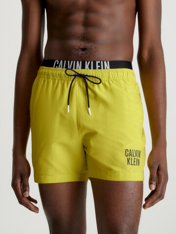 Calvin Klein Swimwear Board Shorts in Yellow: front