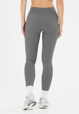 Athlecia Skinny Workout Pants 'Aliya V2' in Grey: front