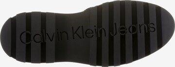 Calvin Klein Jeans Mules in Black