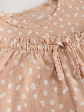 Pigiama di Next in beige