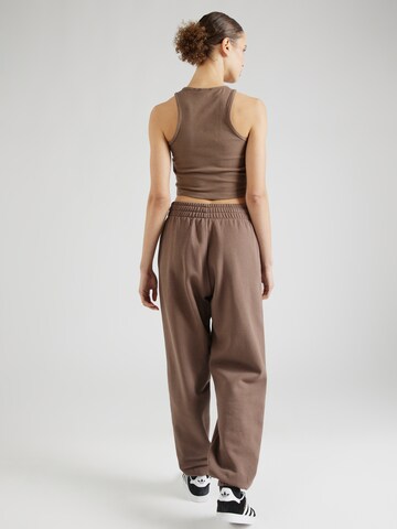 ADIDAS ORIGINALS Tapered Trousers 'Essentials Fleece' in Brown