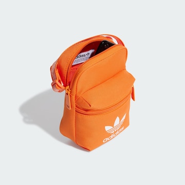 ADIDAS ORIGINALS Чанта за през рамо тип преметка 'Classic Festival' в оранжево