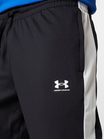 UNDER ARMOUR Tapered Sporthose in Schwarz