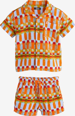 Next Setti värissä oranssi: etupuoli