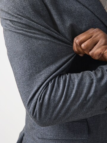Next Slim fit Business-colbert 'Motionflex' in Grijs