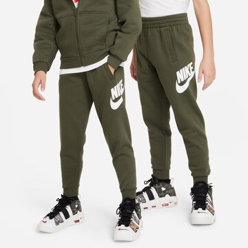 Nike Sportswear Tapered Pants in Green: front