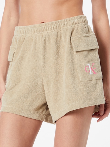Calvin Klein Swimwear - Calças cargo em bege: frente