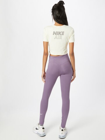 NIKE Skinny Sporthose in Lila