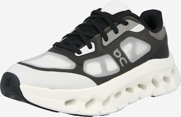 On Platform trainers 'Cloudtilt Remix' in Black: front