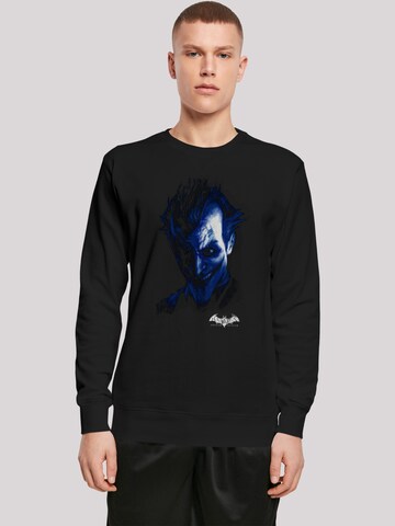 Sweat-shirt 'DC Comics Batman Arkham Asylum Joker Face Distress' F4NT4STIC en noir : devant