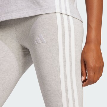 Skinny Pantaloni sportivi 'Essentials' di ADIDAS SPORTSWEAR in grigio