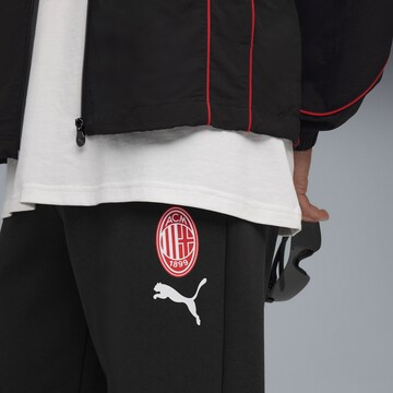 Effilé Pantalon de sport PUMA en noir