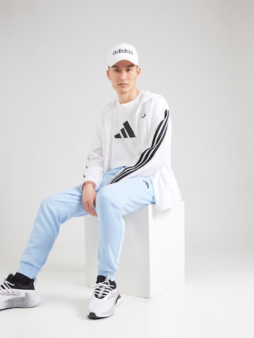 ADIDAS SPORTSWEAR Tapered Sportbyxa 'FEELCOZY' i blå