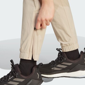 Effilé Pantalon de sport 'Utilitas' ADIDAS TERREX en beige