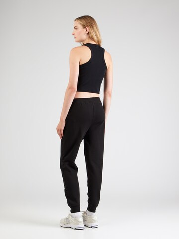 ELLESSE - Tapered Pantalón 'Marana' en negro